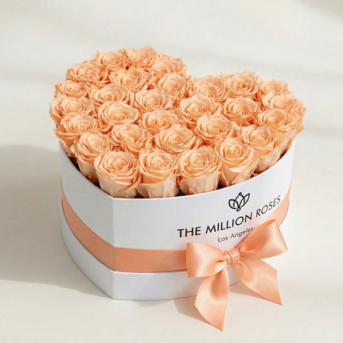28-30 Peach Preserved Roses in White Heart Gift Box